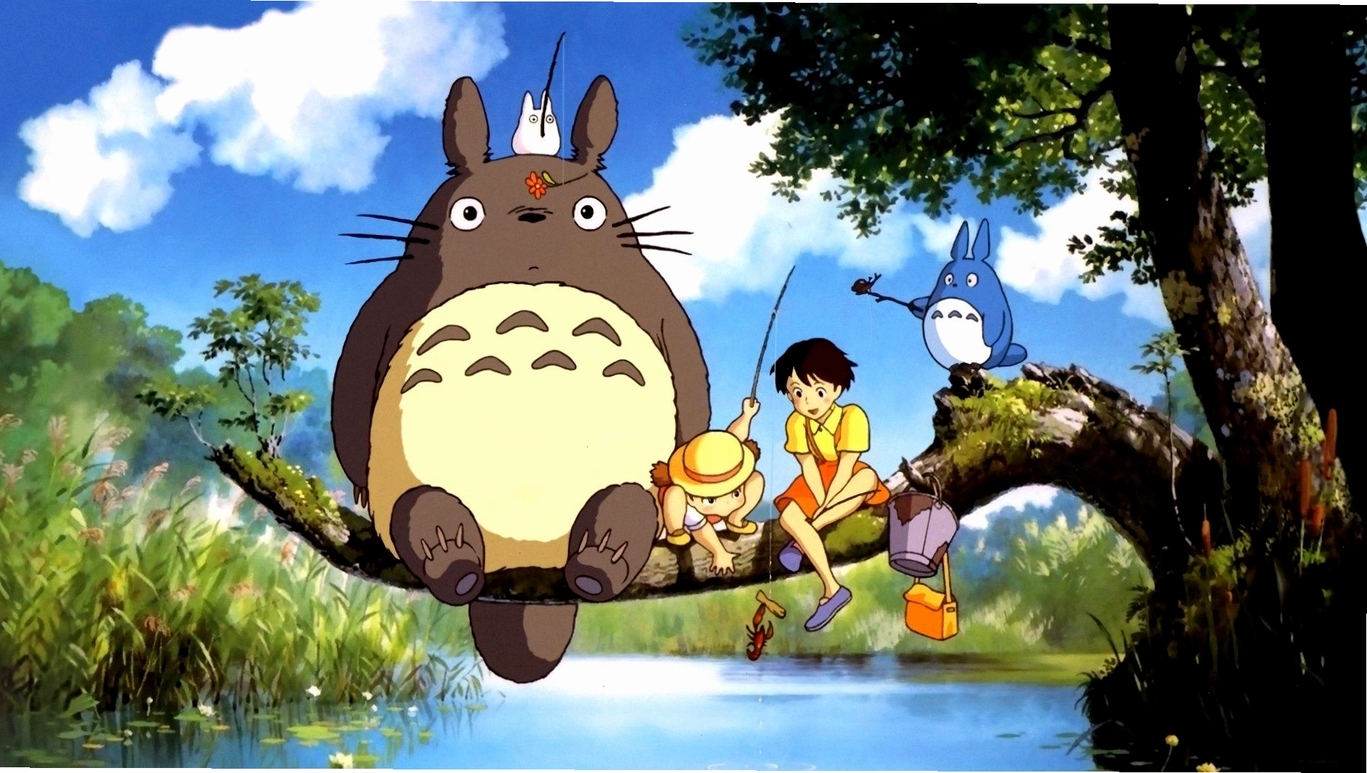 Hình nền máy tính Totoro đang vui đùa dưới gốc cây lớn
