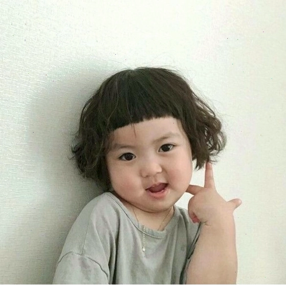 Meme em bé cười tươi vui với biểu cảm vô cùng hạnh phúc